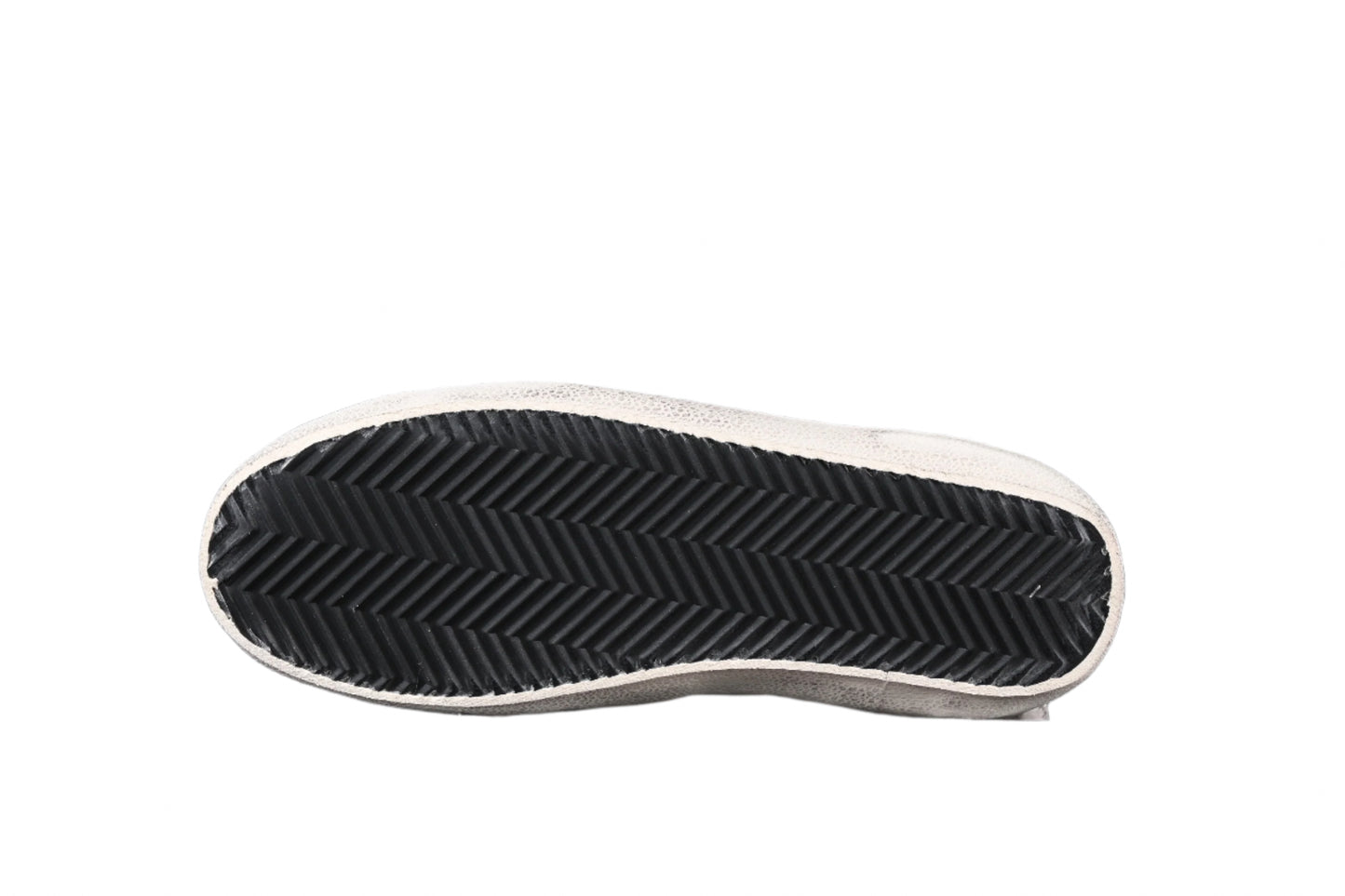 Black sole of a shoe on a black background